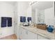 Bathroom features a modern countertop and ample storage at 17076 Se 96Th Chapelwood Cir, The Villages, FL 32162