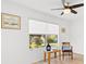Bedroom featuring a ceiling fan, natural light, and decoratively furnished at 17076 Se 96Th Chapelwood Cir, The Villages, FL 32162