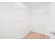 Walk-in closet offers ample storage space at 17076 Se 96Th Chapelwood Cir, The Villages, FL 32162