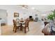 Bright, open living space featuring hardwood floors and plenty of seating at 17076 Se 96Th Chapelwood Cir, The Villages, FL 32162