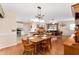 Inviting dining area with seamless connection to the living room and kitchen, ideal for entertaining at 1709 Betrillo Ct, The Villages, FL 32162