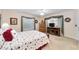 Large main bedroom with a ceiling fan and ample natural light from the windows at 1709 Betrillo Ct, The Villages, FL 32162