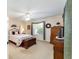 Cozy main bedroom with a large window and neutral décor at 1709 Betrillo Ct, The Villages, FL 32162