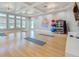 This yoga room offers a serene space for wellness activities, featuring yoga mats, natural light, and fitness accessories at 17386 Blazing Star Cir, Clermont, FL 34714