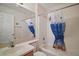 Bathroom featuring a tub and shower combo with stylish shower curtain and vanity at 1902 Del Norte Dr, Lady Lake, FL 32159