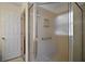 Shower stall featuring glass door and bright tile at 1902 Del Norte Dr, Lady Lake, FL 32159