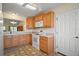 Functional kitchen with ample counter space and convenient access to the dining area at 1902 Del Norte Dr, Lady Lake, FL 32159