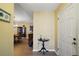 Inviting entryway showcases a charming dining room and stylish decor, creating a warm and welcoming atmosphere at 20 Ginger Cir, Leesburg, FL 34748