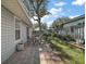 Cozy outdoor patio with dining set perfect for entertaining or relaxing at 20 Ginger Cir, Leesburg, FL 34748