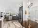 Charming kitchen with a dining area, stainless steel appliances, and views of the backyard at 2006 Oppenheimer Ct, The Villages, FL 34762