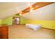 Spacious bonus room with a sliding glass door, wood paneling, and ceiling fans at 2112 Robie Ave, Mount Dora, FL 32757