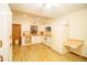 Well-lit kitchen featuring white appliances and ample counter space at 2112 Robie Ave, Mount Dora, FL 32757