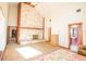 Bright main bedroom with stone fireplace, ensuite bath, and large window offering ample natural light at 2112 Robie Ave, Mount Dora, FL 32757