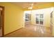 Relaxing sunroom with natural light, carpet flooring, and sliding glass doors at 2112 Robie Ave, Mount Dora, FL 32757
