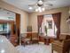 Cozy breakfast nook with window views and tile flooring next to the kitchen at 21815 Tartan St, Leesburg, FL 34748
