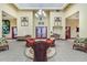 Lobby with tropical style furniture, tile flooring, and well lit with recessed lighting at 21815 Tartan St, Leesburg, FL 34748