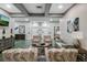 Comfortable lobby with stylish furniture, modern artwork, and neutral color scheme at 21815 Tartan St, Leesburg, FL 34748