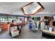 Well-stocked pro shop with golf apparel, accessories, and a service counter for golfers at 21815 Tartan St, Leesburg, FL 34748