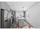 Open concept kitchen featuring stainless steel appliances and eat-in island at 2270 Griffin Rd, Bartow, FL 33830