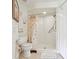 Cozy bathroom with walk-in shower, toilet, and beach themed shower curtain at 236 Juniper Way, Tavares, FL 32778