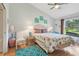 Bright bedroom with a beach theme, featuring a ceiling fan and natural light at 236 Juniper Way, Tavares, FL 32778