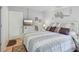 Bedroom featuring a bed, TV, dresser, and themed decor, creating a relaxing space at 236 Juniper Way, Tavares, FL 32778