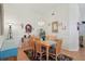 Formal dining room with elegant chandelier and seating for six at 236 Juniper Way, Tavares, FL 32778