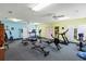 Well-equipped gym features various exercise machines and equipment for a comprehensive workout experience at 236 Juniper Way, Tavares, FL 32778