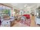Bright living room with hardwood floors and comfortable seating at 236 Juniper Way, Tavares, FL 32778