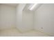 Small storage room featuring tile flooring and a single fluorescent light at 26207 Avenida Las Colinas # 26207, Howey In The Hills, FL 34737