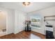 Bedroom with wood flooring, a window for natural light, and a closet at 274 Giovani Blvd, Clermont, FL 34715
