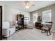 Comfortable living room featuring plush seating, neutral tones, and plenty of natural light at 2894 Southern Pines Loop, Clermont, FL 34711