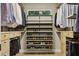 Well organized closet with built-in shelving, drawers and hanger storage space at 30236 Pga Dr, Sorrento, FL 32776