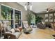 Comfortable living room with a large window, offering lots of natural light at 30236 Pga Dr, Sorrento, FL 32776