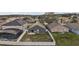 Aerial view of backyard featuring a white vinyl fence, patio, and space for outdoor activities at 308 Anorak St, Groveland, FL 34736