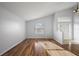 Bright living room featuring hardwood floors and lots of natural light at 308 Anorak St, Groveland, FL 34736