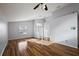 Bright living room featuring hardwood floors, neutral colors and lots of light at 308 Anorak St, Groveland, FL 34736