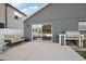 Back patio with an outdoor grilling space and a patio seating area at 308 Anorak St, Groveland, FL 34736