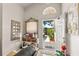 Inviting foyer with tile floors, an open doorway and neutral decor at 3785 Avon Ct, Clermont, FL 34711