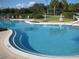 Relaxing community swimming pool with ample seating and a serene, inviting atmosphere at 3785 Avon Ct, Clermont, FL 34711