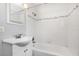 Clean bathroom features a tiled shower and bath combo and single vanity at 3972 Poinsettia Ave, Mount Dora, FL 32757