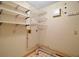 This unfinished basement features lots of storage space with shelves at 40325 Emeralda Island Rd, Leesburg, FL 34788