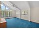 Bright room features high ceilings and large windows at 40325 Emeralda Island Rd, Leesburg, FL 34788