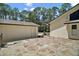 Exterior view of the side yard, patio and detached garage at 40325 Emeralda Island Rd, Leesburg, FL 34788