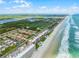A coastal aerial view showcasing condos, beaches, and Intracoastal Waterway at 4435 S Atlantic Ave # 114, Ponce Inlet, FL 32127