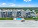 Beachfront condos featuring private balconies overlooking the ocean and pool at 4435 S Atlantic Ave # 114, Ponce Inlet, FL 32127