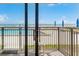 Relaxing balcony view showcasing the pool and ocean, inviting tranquility and vacation vibes from this condo at 4435 S Atlantic Ave # 114, Ponce Inlet, FL 32127