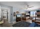 Cozy bedroom with bunk beds, TV, and beach view, offering a relaxing space at 4435 S Atlantic Ave # 114, Ponce Inlet, FL 32127