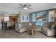 Open-concept living area featuring a comfortable sectional and kitchen access, great for entertaining at 4435 S Atlantic Ave # 114, Ponce Inlet, FL 32127