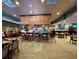 A vibrant bar scene filled with patrons enjoying drinks and conversation in a relaxed and inviting setting at 4671 Spring Grove Ln, Leesburg, FL 34748